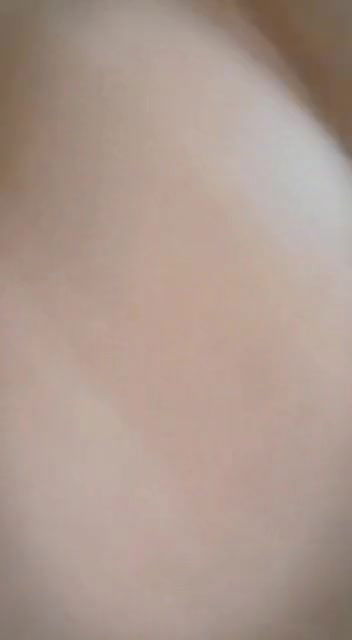 Cute sexy girlfriend recording herself for her boyfriend