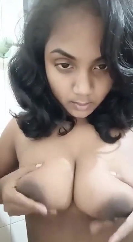Desi Indian girl plays on camera with her boobs