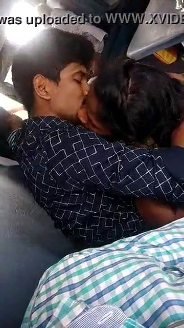 lovers kissing romance in public train