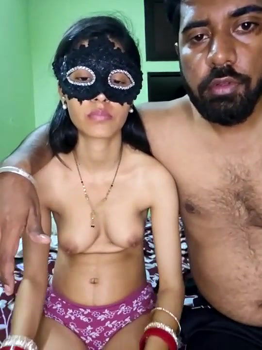 Naked Couple Kissing in Bedroom