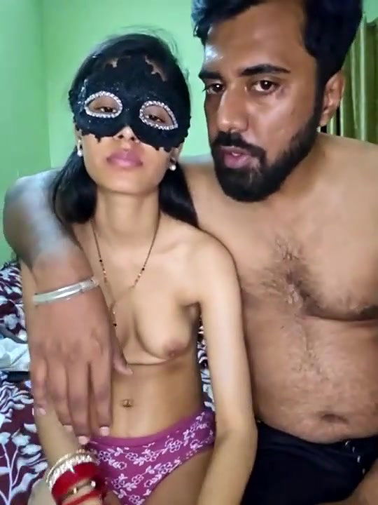 Naked Couple Kissing in Bedroom