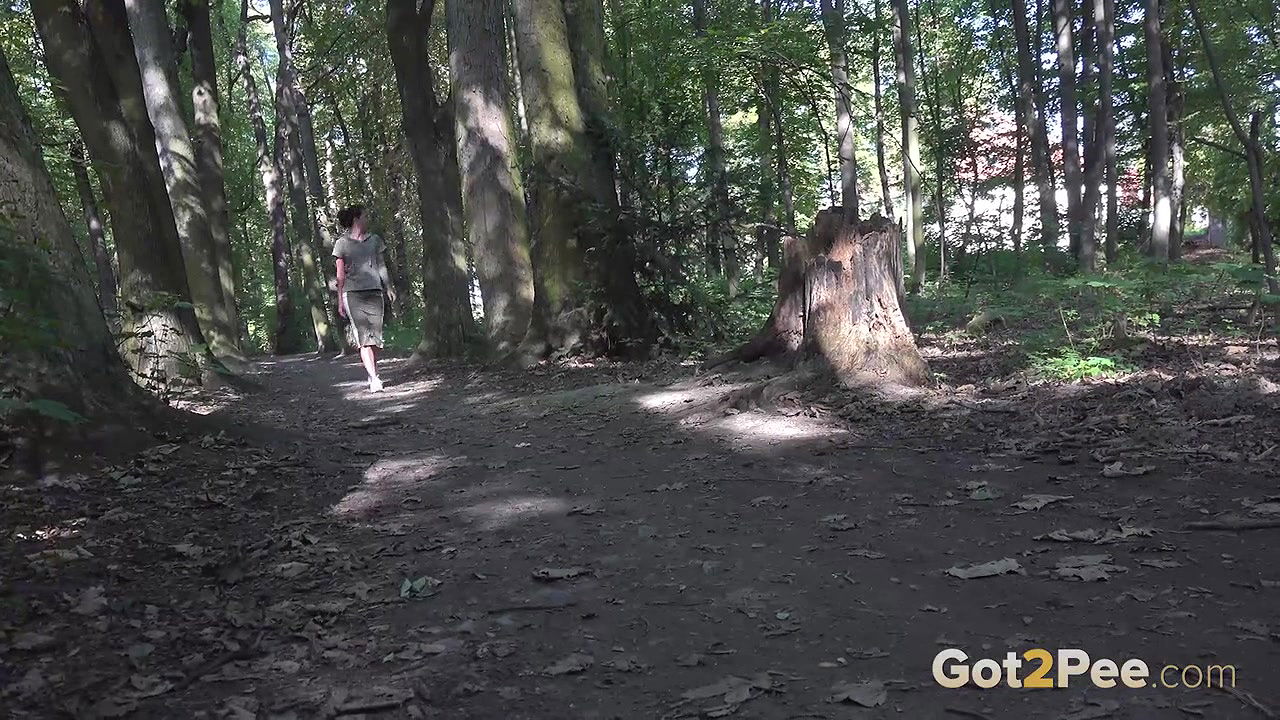 Ali Bordeaux relieves herself in the woodland