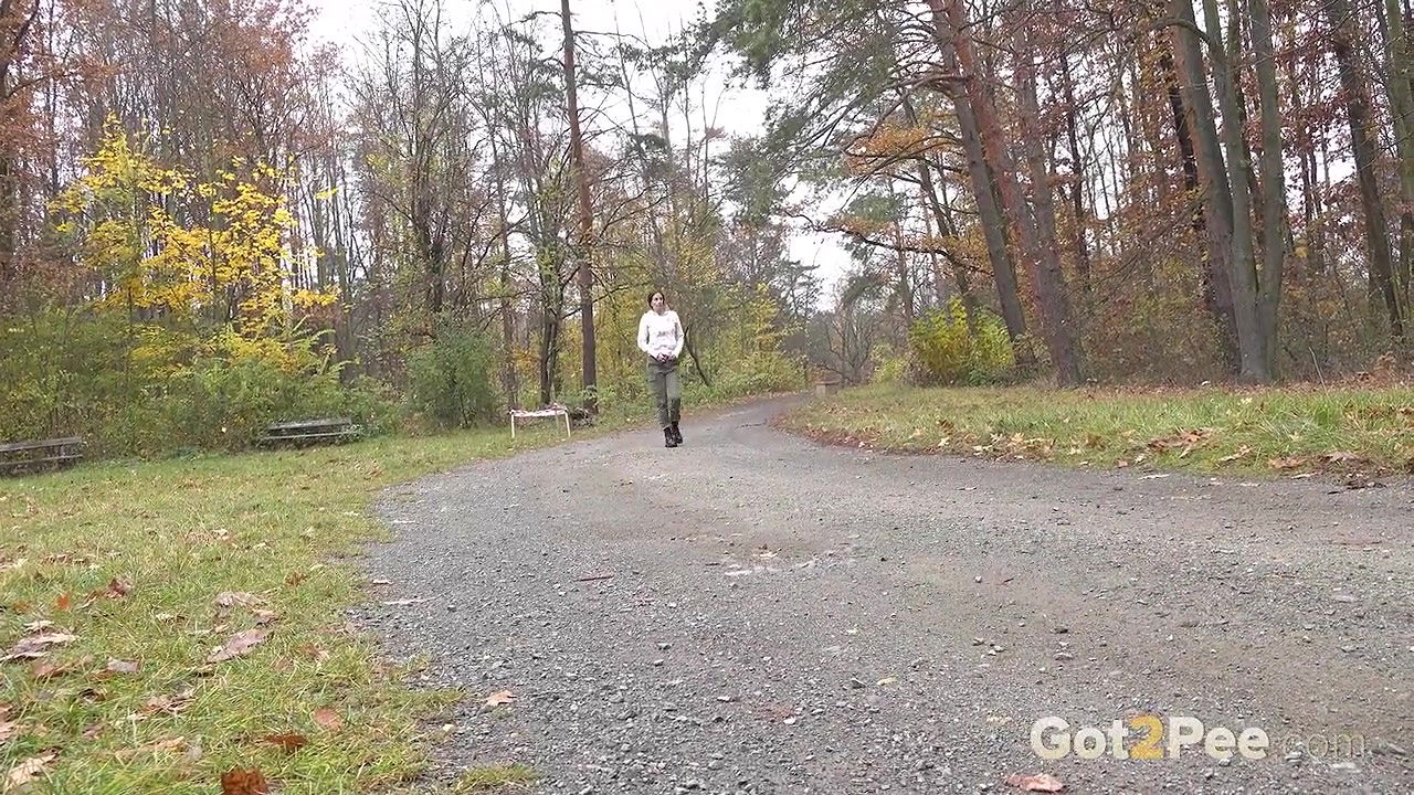 Ali Bordeaux squats and pees on a wooden bench