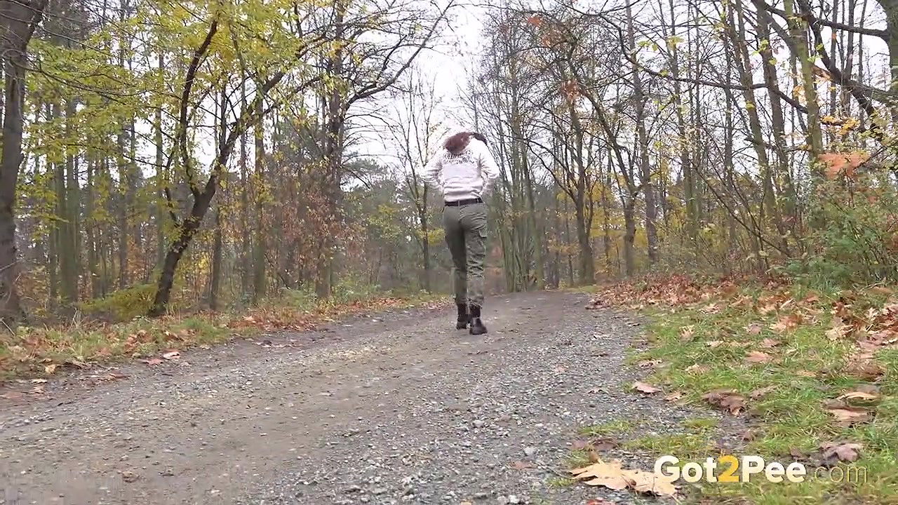 Ali Bordeaux squats and pees on a wooden bench