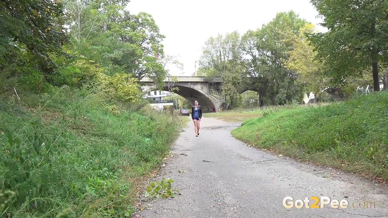 Amanda Hill relieves her piss desperation outside