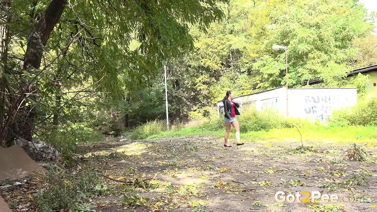 Amanda Hill relieves herself in the suburbs