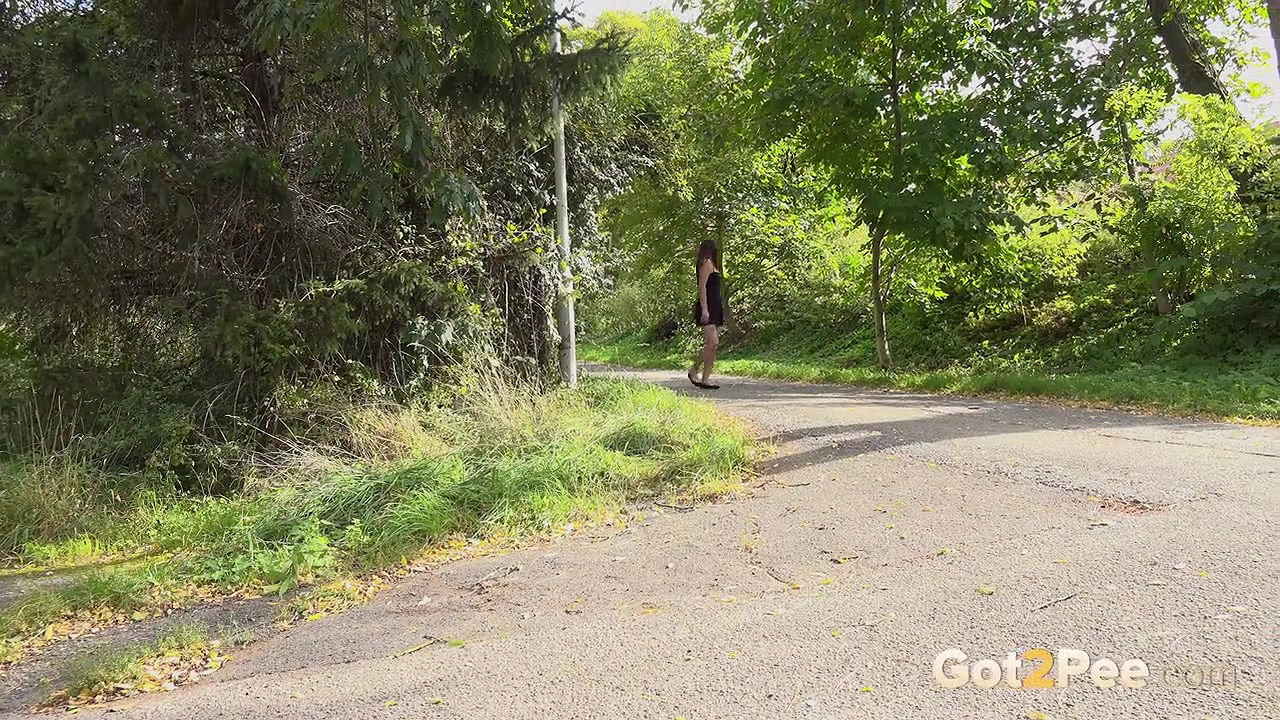 Amanda Hill squats and enjoys a long piss outside