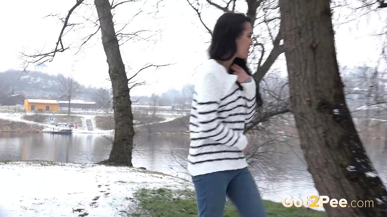 Black haired babe relieves her piss desperation