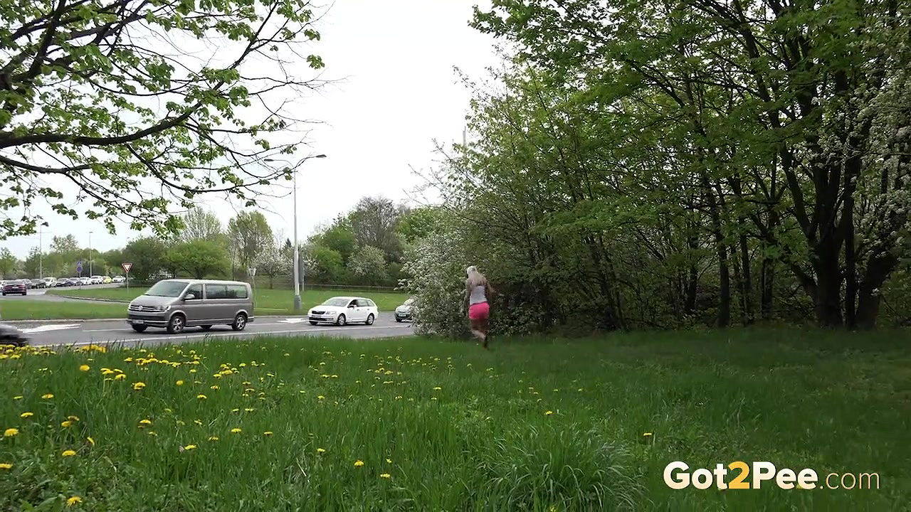 Blonde babe relieves herself in public piss video