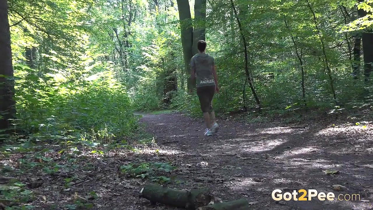 Ali B relieves her pee desperation in the woods
