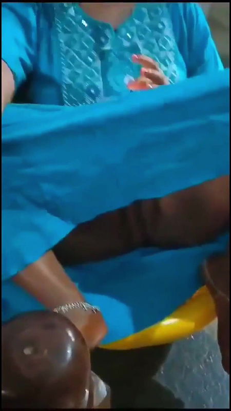 KannadaAuntySittingOnChair