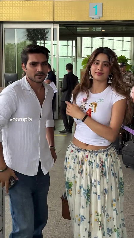 Actress Jhanvi Kapoor closeup boobs navel show at airport