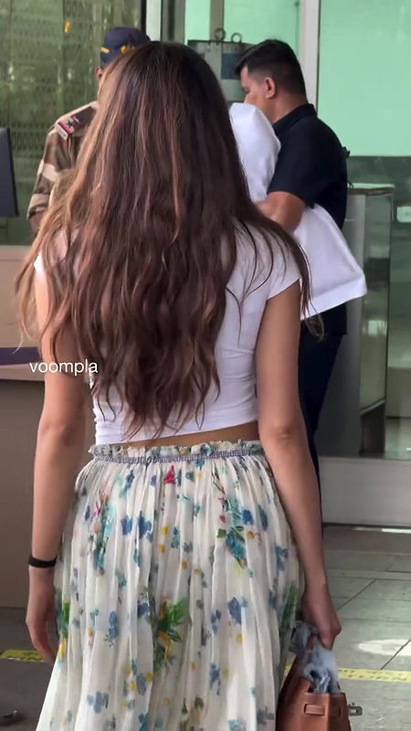 Actress Jhanvi Kapoor closeup boobs navel show at airport