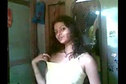 solo teen girl strips in front of cam