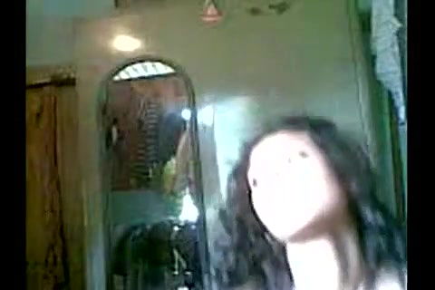 solo teen girl strips in front of cam