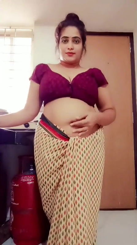 Busty Bangla naked Boudhi strips and shows her body