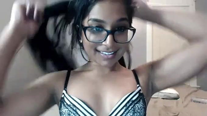 Naughty and sexy Indian chick in glasses is happy to suck tasty dick