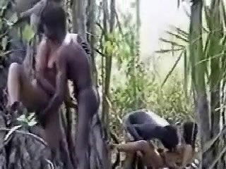 Two couples having sex and switching partners in the woods