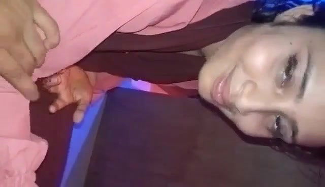 Shy girlfriend sucking dick of lover through pant zip open