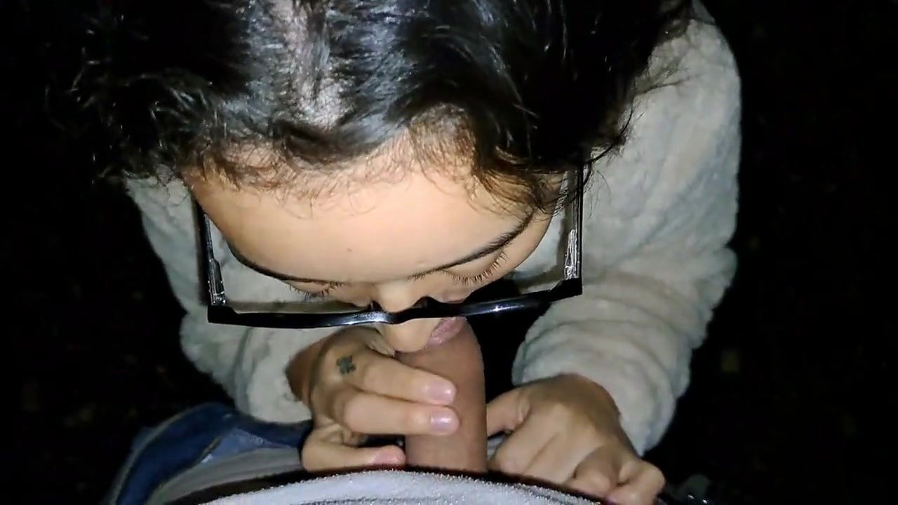 Stepsister gives a blowjob while taking a walk in the woods outdoor