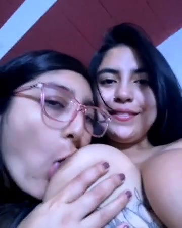 Horny Girl Sucking Lesbian Friends Boob