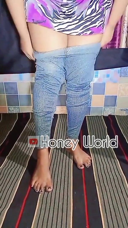 wearing violet top and jeggings