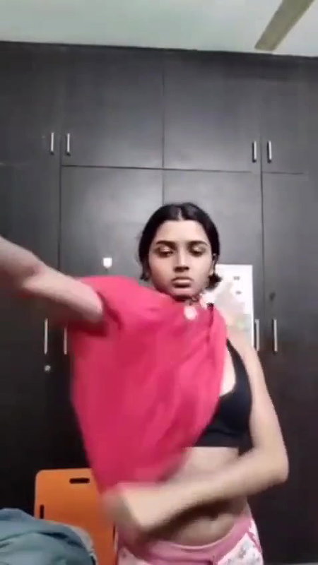 Young Beautiful Indian Girl Changing Clothes