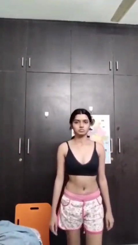 Young Beautiful Indian Girl Changing Clothes
