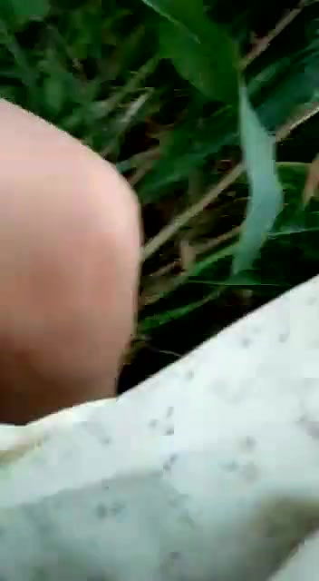 crazy guy fingering gf in open field
