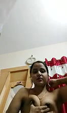 beautiful girl boob pressing
