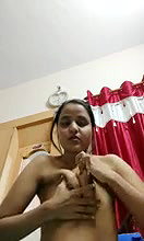 beautiful girl boob pressing