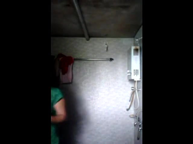 girl getting undress in bathroom