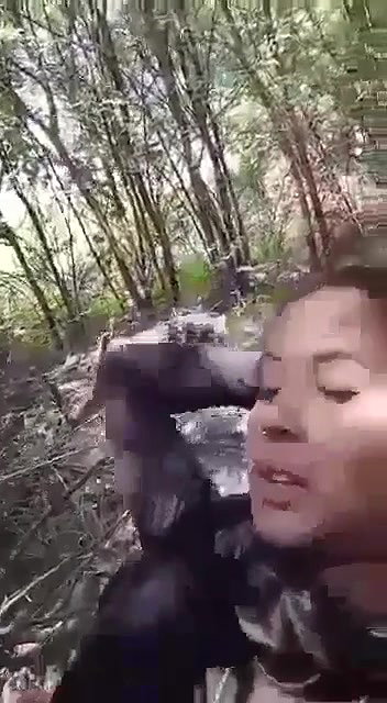 couple having sex in forest