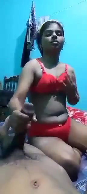 young girl blowing