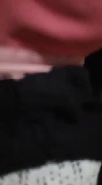 teen girl pressing own boobs