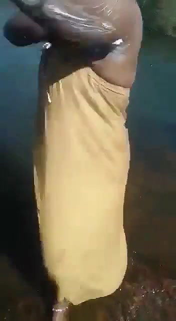tamil wife bathing in outdoor river
