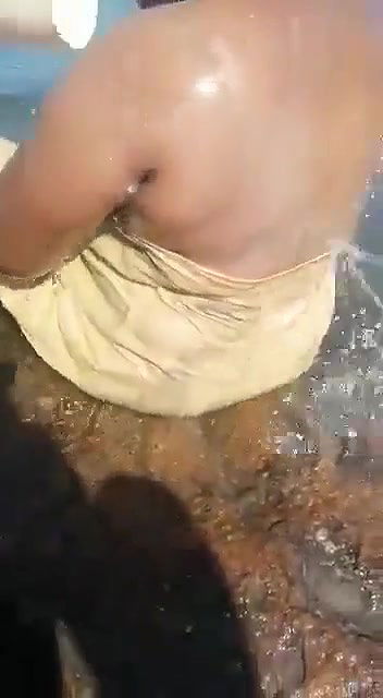 tamil wife bathing in outdoor river