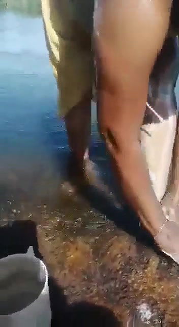 tamil wife bathing in outdoor river