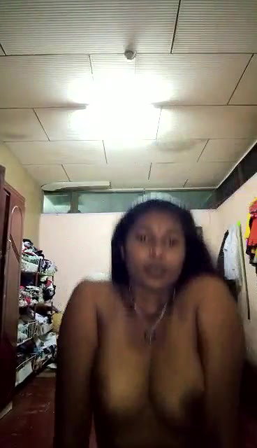 dusky indian girl pressing own boobs