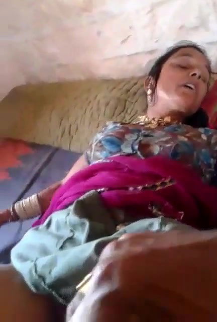 guy rubbing shaved pussy of mature bhabhi