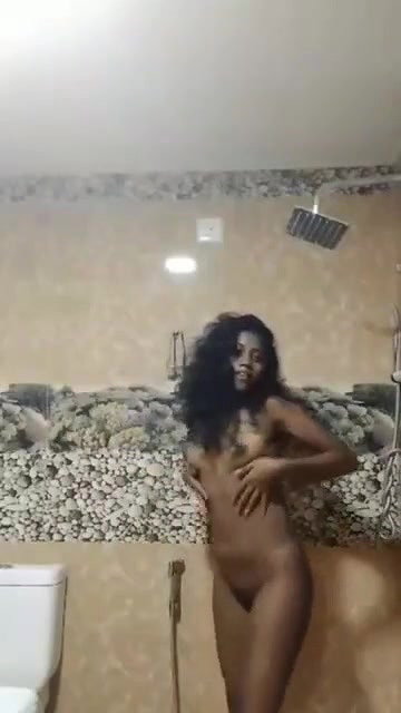 nude teen girl pressing own boob in bathroom