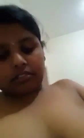 dusky girl showing dark nipple