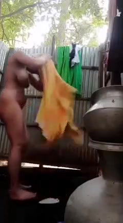 beautiful girl making nude bathing video