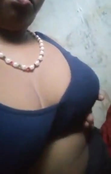 teen girl pressing own boob