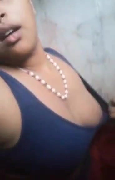 teen girl pressing own boob