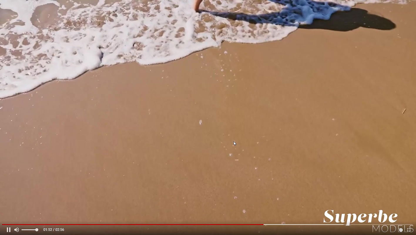 Fetching babe Baby Nicols passionately showcases her perfect natural figure while posing on the beach