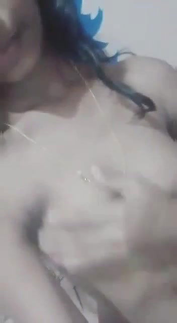 small boob girl pressing own boob