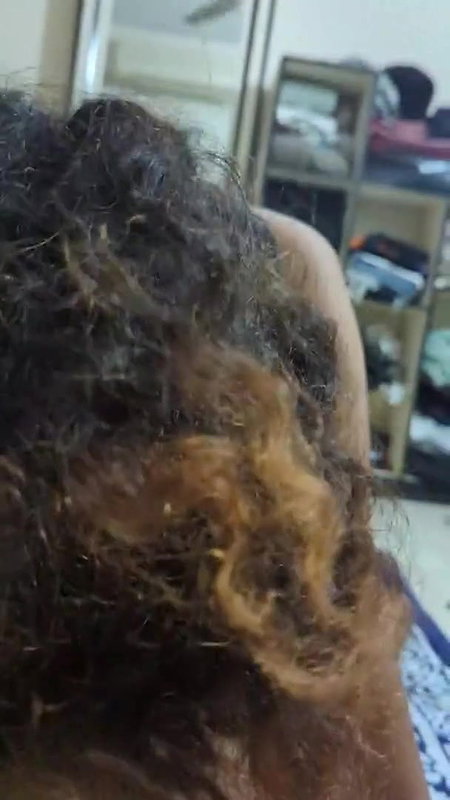 curly hair girl blowing bf