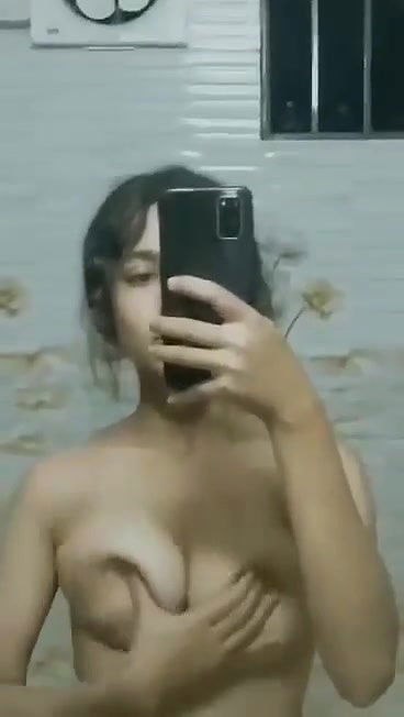 cute girl boobs rub in bathroom mirror selfie