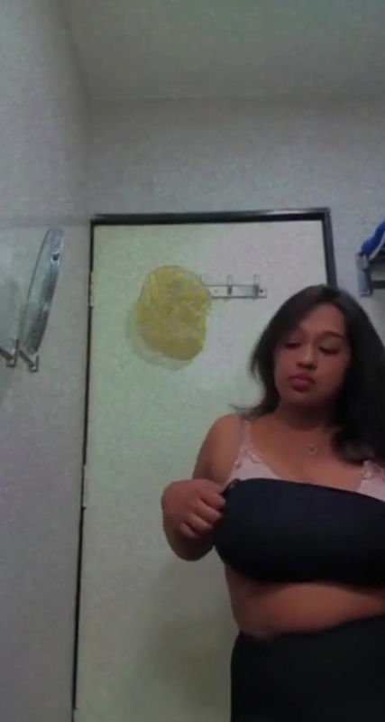 cute girl showing her big boobs